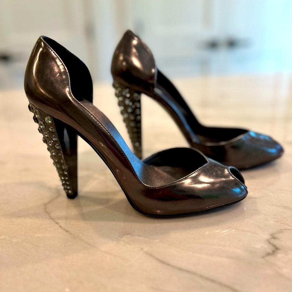MIU MIU gun metal gray heels with rhinestone studded heels.